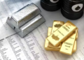 Gold, silver gain on easing tensions; crude oil plunges nearly 17%