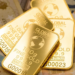 Gold near two-week high as weak dollar and easing Iran tensions support prices