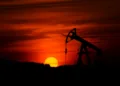 Crude oil rises on Middle East supply concerns; Natural gas gains on short covering
