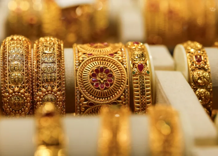 Gold slips amid Iran tensions, oil jumps on Hormuz attack; Fed holds rates steady