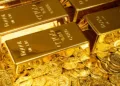 Gold climbs to mid-June high on weak U.S. jobs data