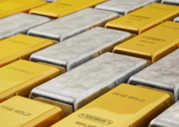 Precious metals ease as dollar firms; oil decline limits losses