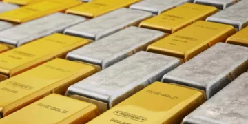 Precious metals ease as dollar firms; oil decline limits losses